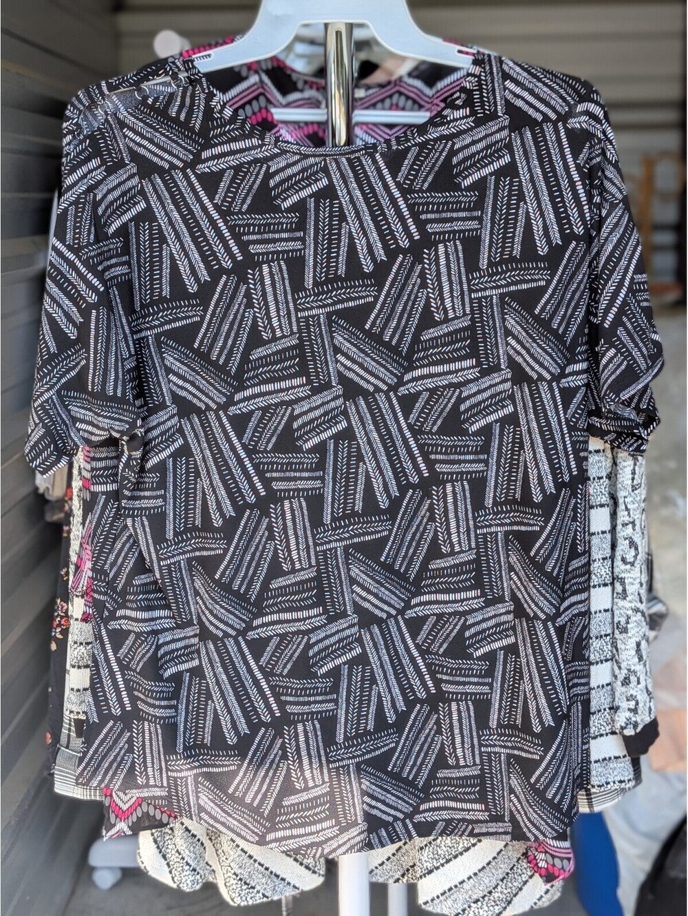 Black geometric print top